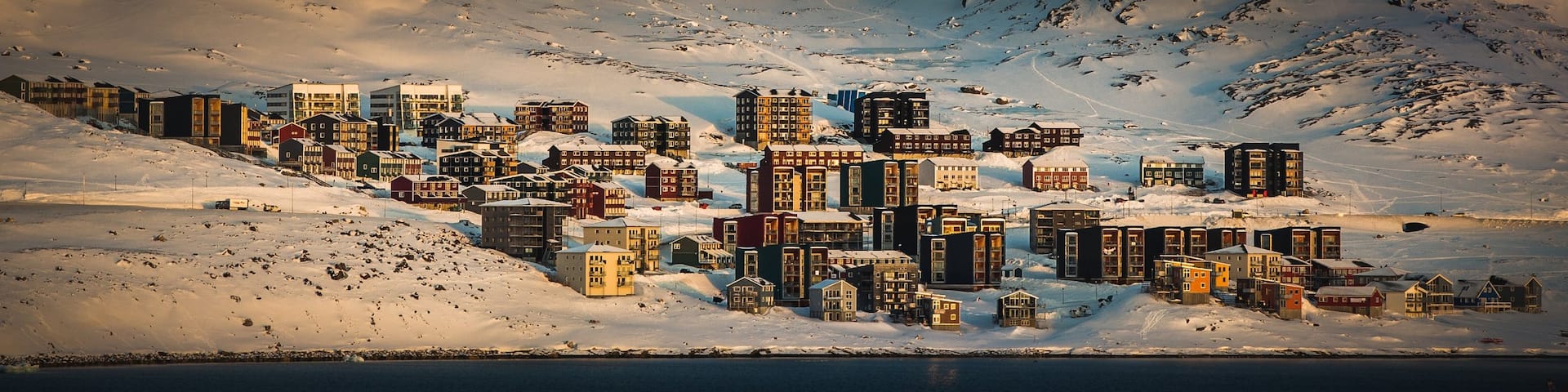 Nuuk featuring snow and a city