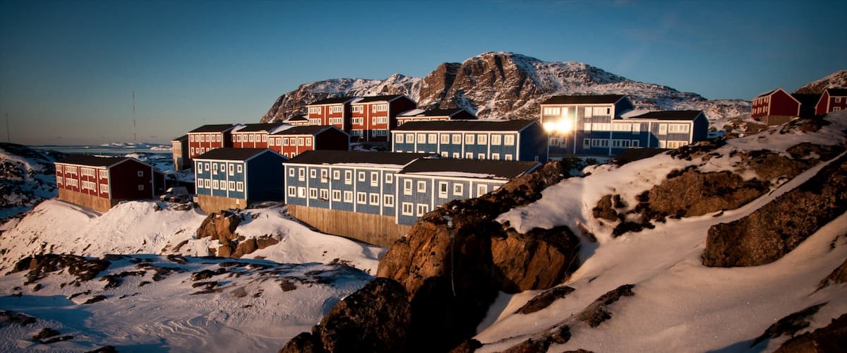 Sisimiut showing a sunset, snow and a small town or village