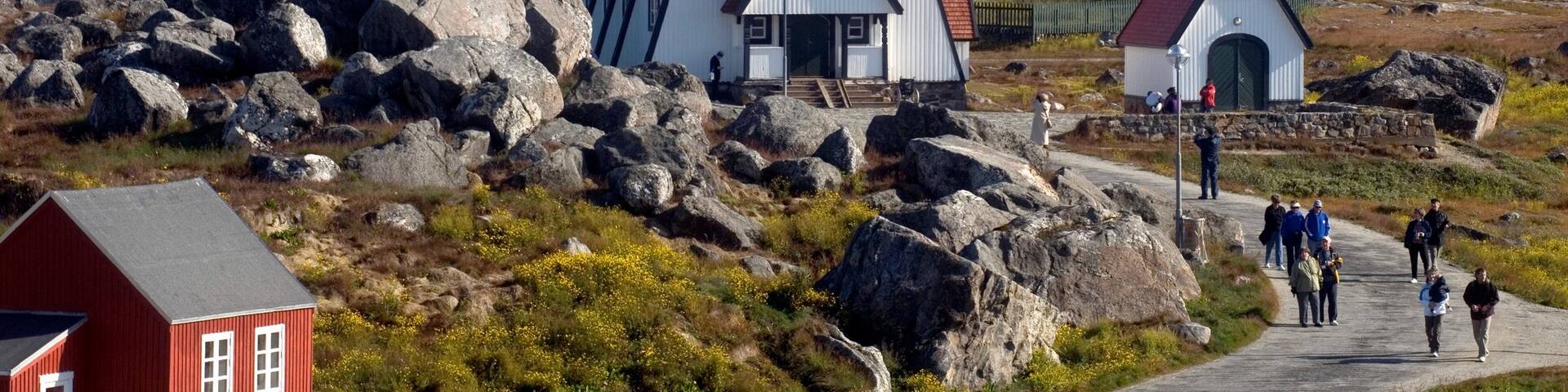 Nanortalik featuring a small town or village and mountains