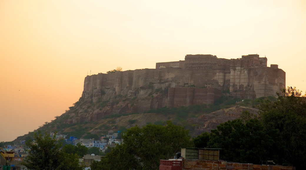 Mehrangarh Fort which includes a sunset