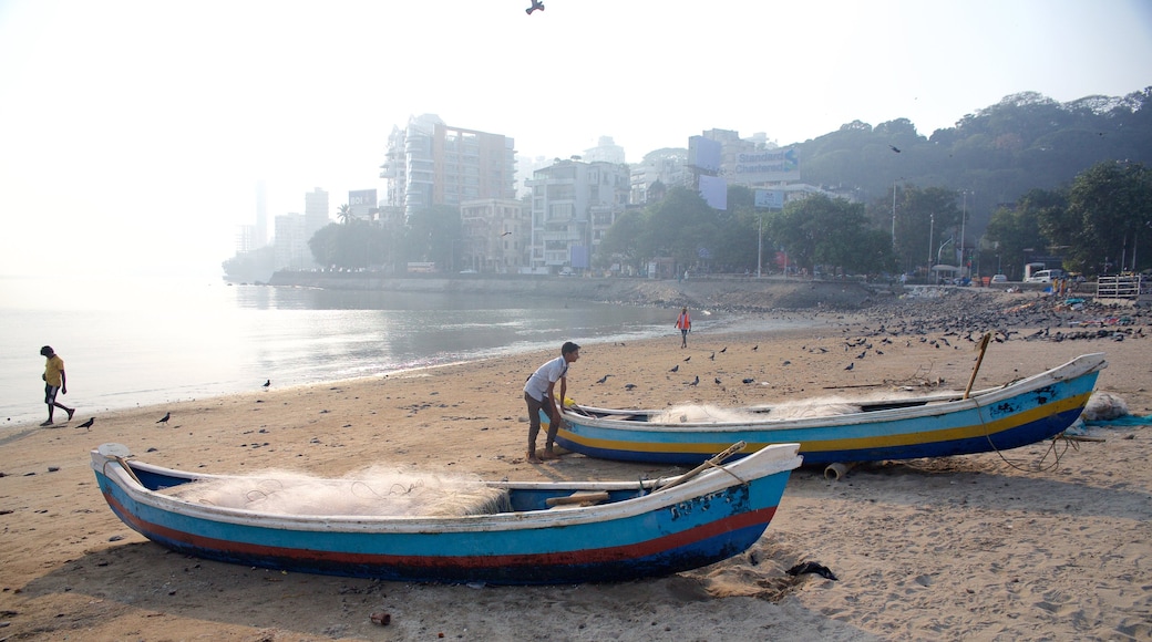 Mumbai which includes general coastal views, boating and a sandy beach