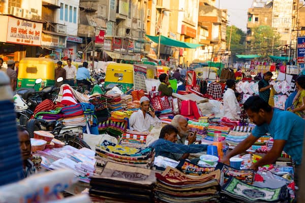 Manek Chowk showing markets and a city