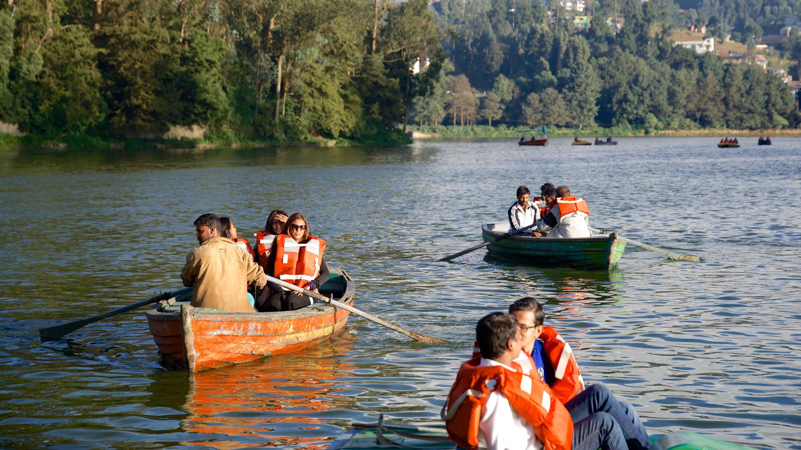 Ooty Lake which includes a lake or waterhole and kayaking or canoeing as well as a small group of people