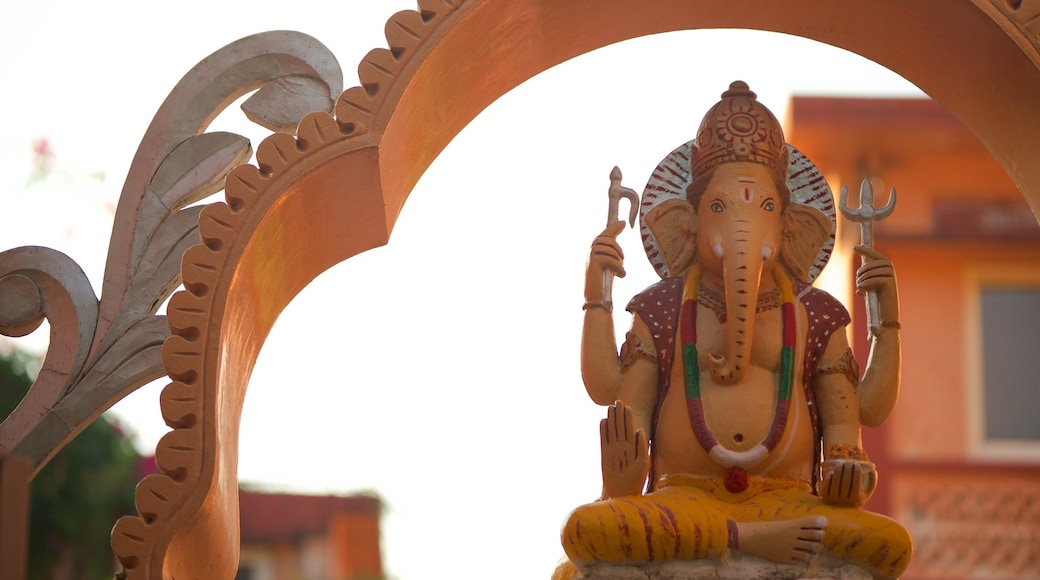 Parmarth Niketan which includes a statue or sculpture and religious elements