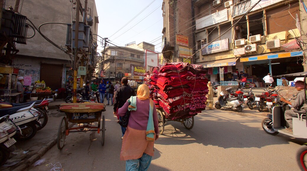Amritsar which includes street scenes and a city as well as a large group of people