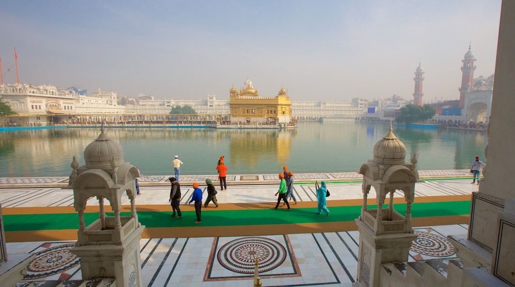 Golden Temple which includes a lake or waterhole, heritage architecture and heritage elements