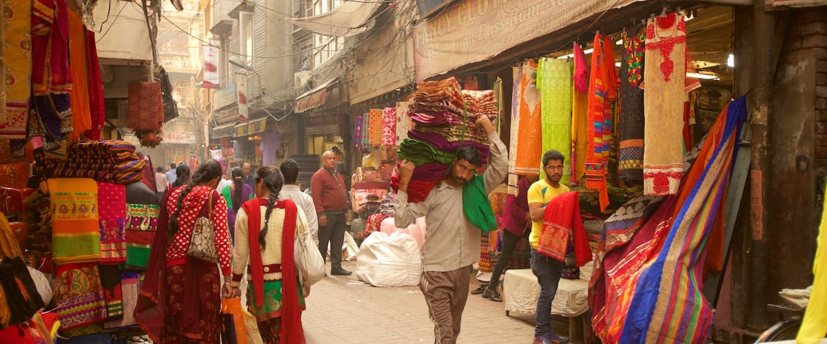 Katra Jaimal Singh Market featuring markets as well as a small group of people