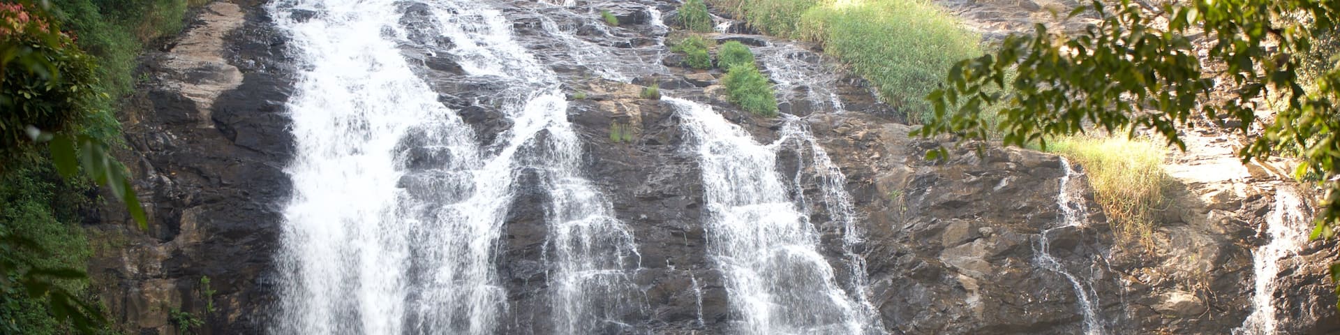 Madikeri featuring a waterfall