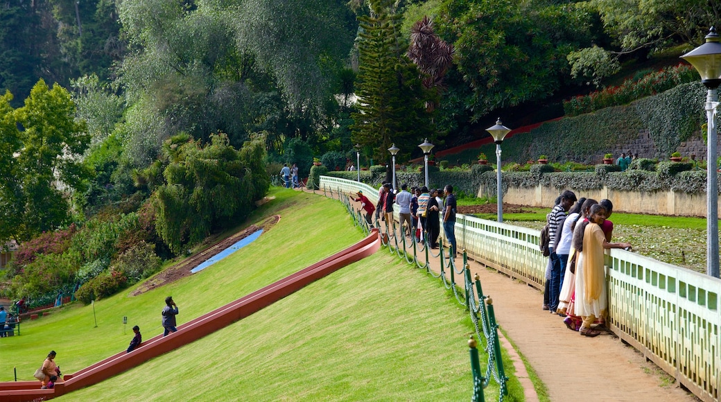 Botanical Gardens featuring a garden as well as a small group of people