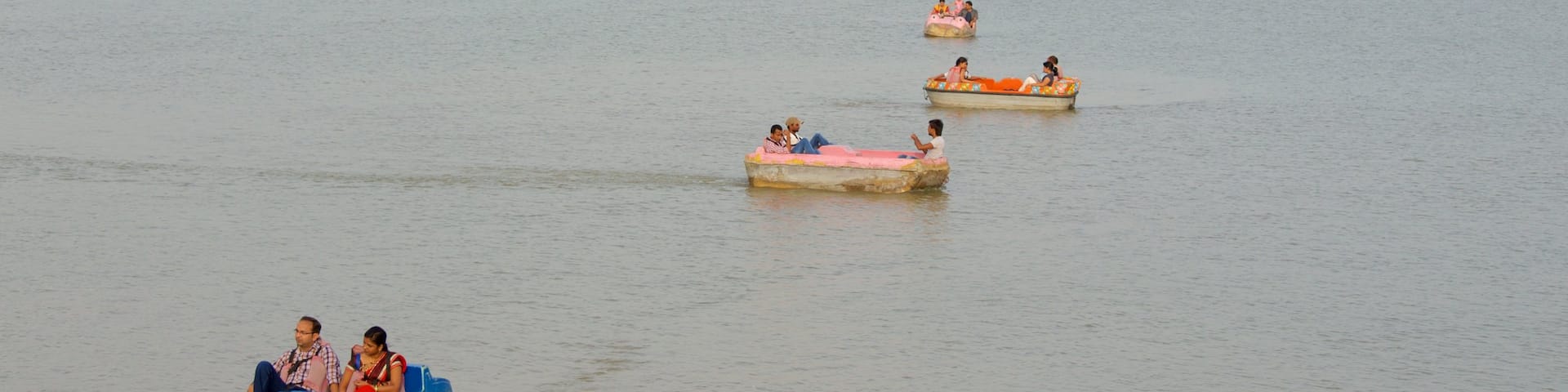 Sukhna Lake which includes kayaking or canoeing and a lake or waterhole as well as a small group of people