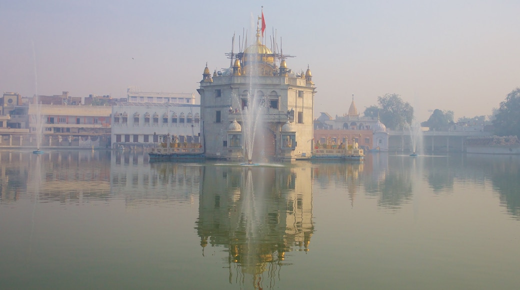 Durgiana Temple showing heritage elements, a lake or waterhole and a temple or place of worship