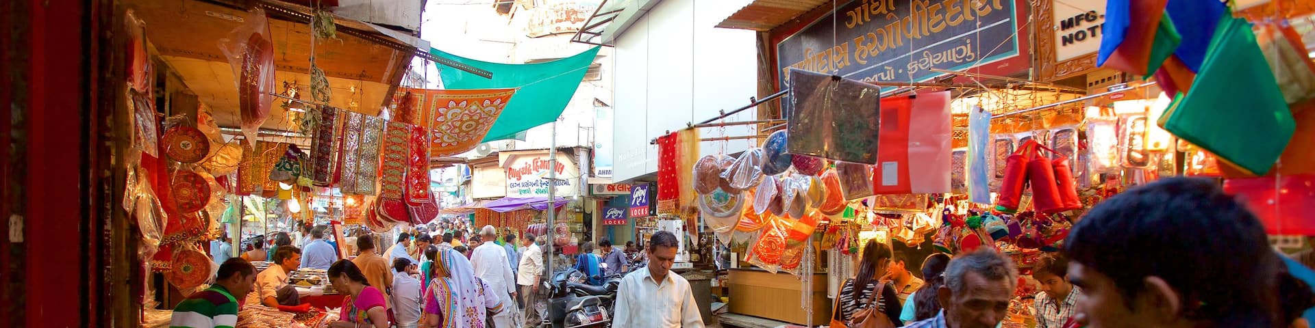 Manek Chowk showing markets as well as a small group of people