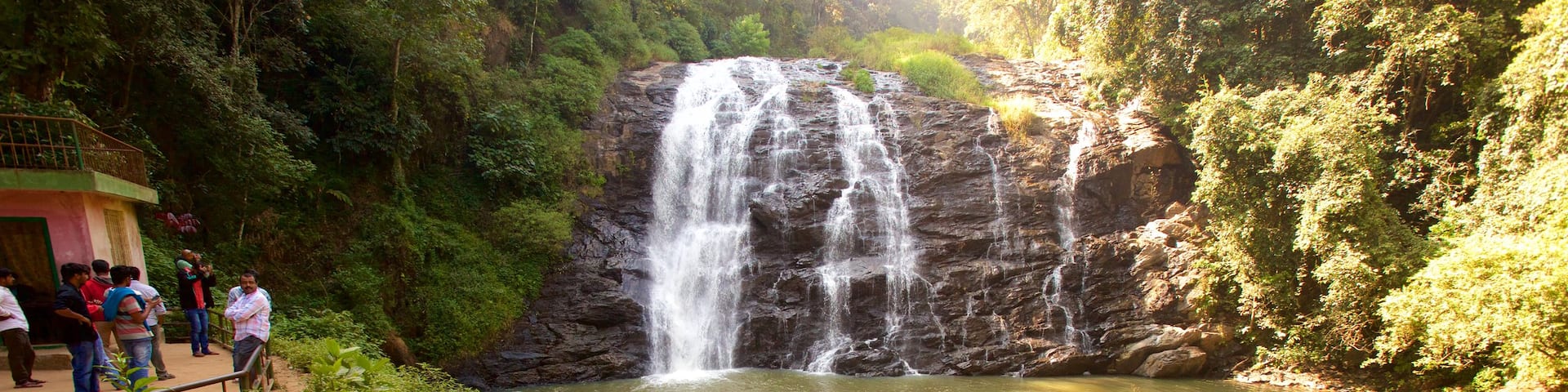 Madikeri featuring a lake or waterhole and a waterfall
