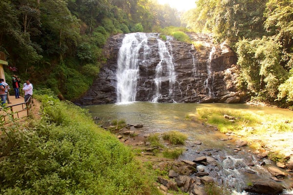 Madikeri which includes a lake or waterhole and a cascade