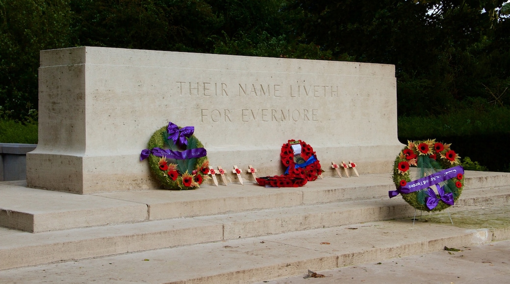 West Flanders which includes a cemetery, flowers and signage