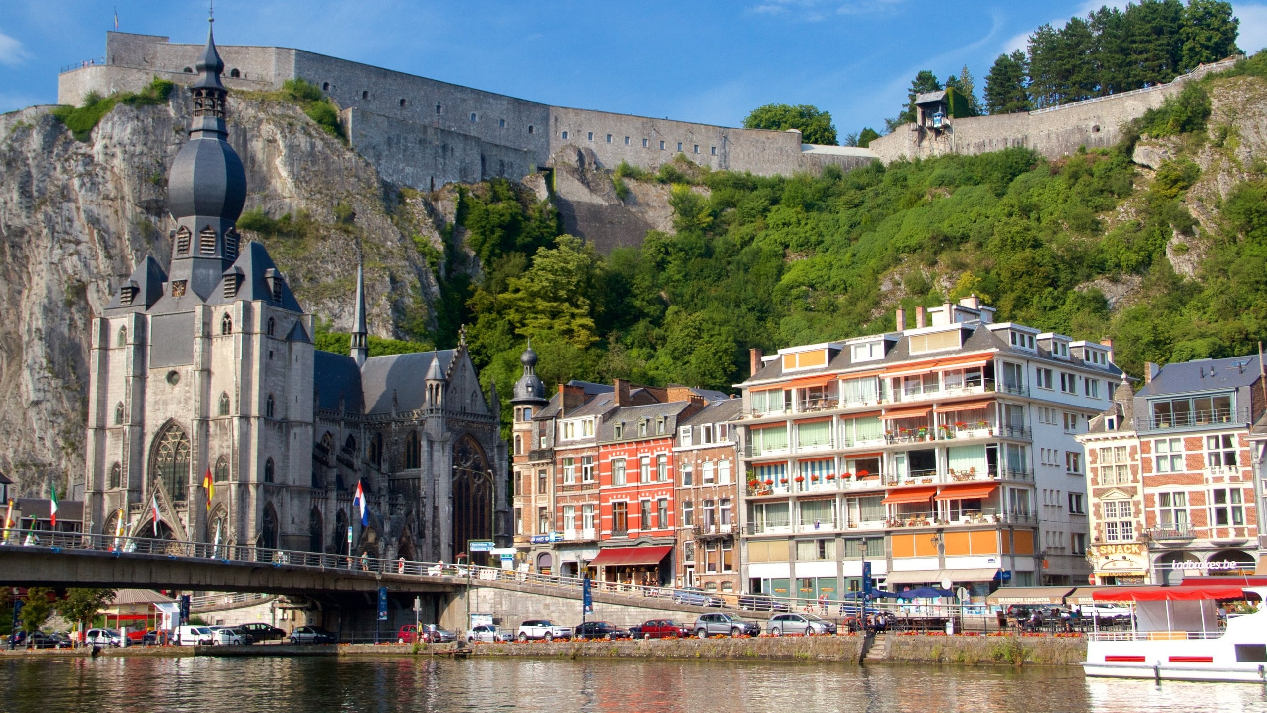 Dinant which includes a church or cathedral, a lake or waterhole and boating