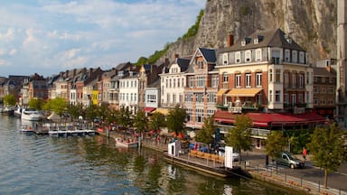 Dinant showing heritage architecture and a lake or waterhole