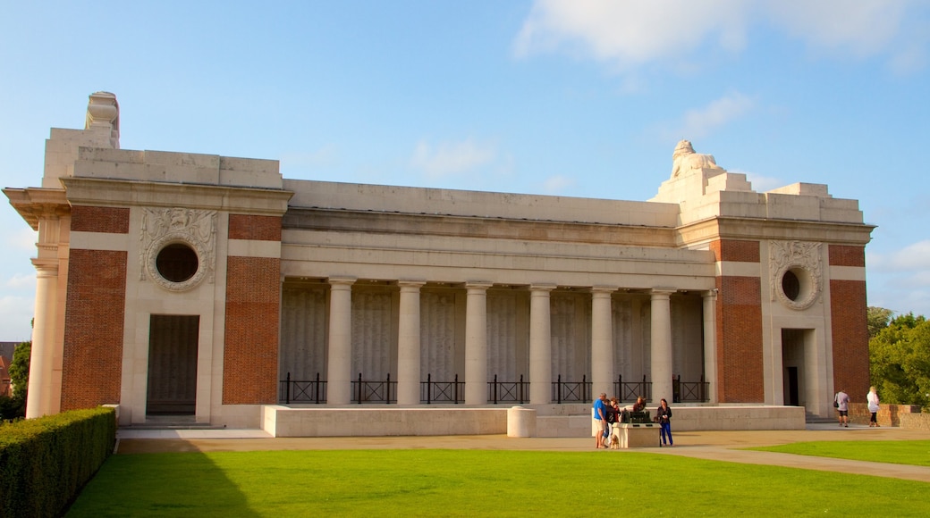 Menin Gate Memorial which includes heritage elements and a park as well as a small group of people