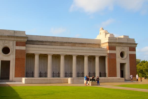 Menin Gate Memorial which includes heritage elements and a park as well as a small group of people