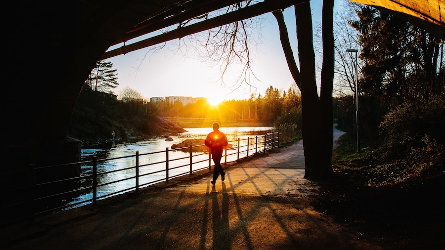 Vantaa featuring a sunset, hiking or walking and a lake or waterhole