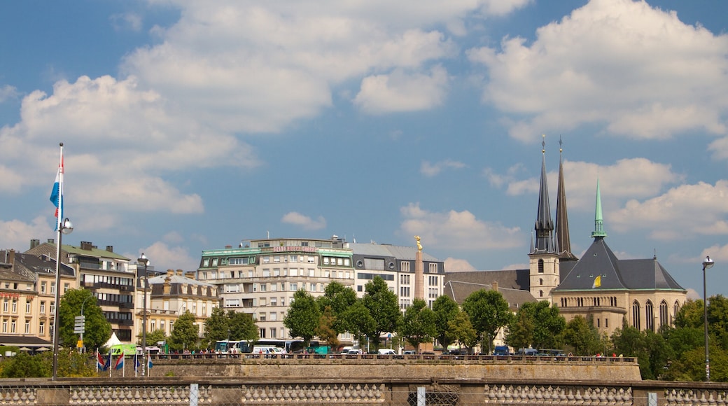 Adolphe Bridge which includes heritage architecture and a church or cathedral