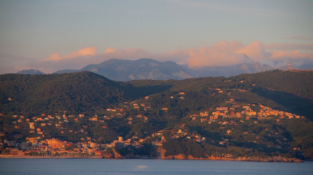 Cinque Terre featuring general coastal views, a small town or village and a sunset