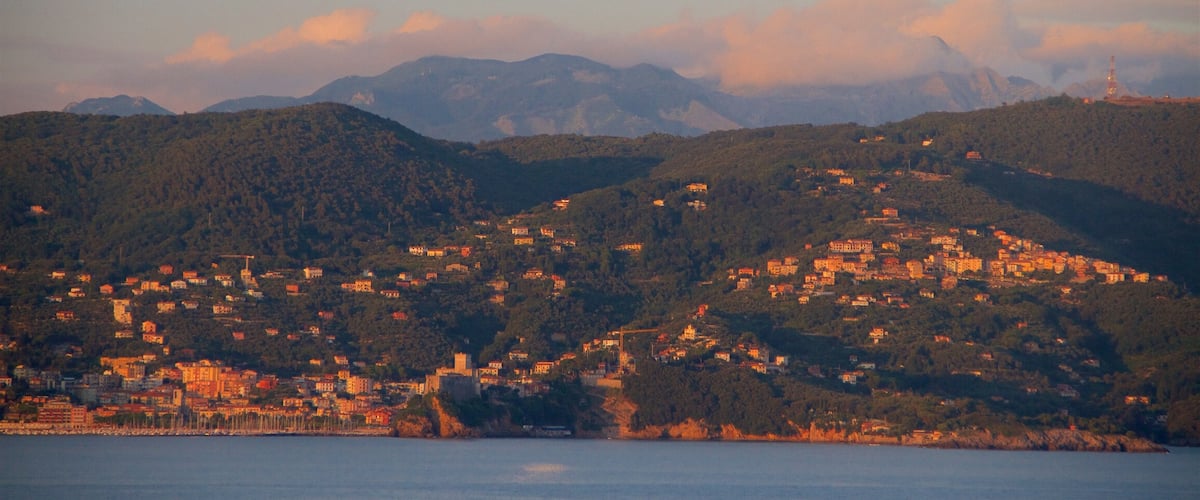 Cinque Terre featuring general coastal views, a small town or village and a sunset