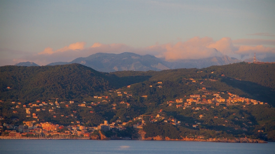 Cinque Terre which includes a sunset, a small town or village and general coastal views