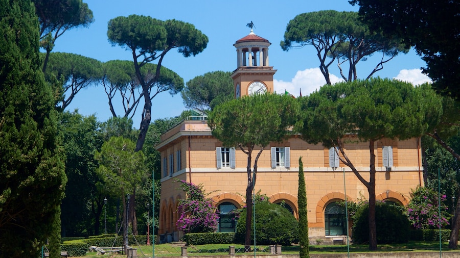Manicured gardens and historic architecture in Villa Borghese Gardens, Rome.