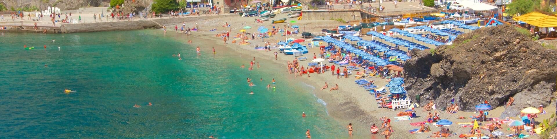 Monterosso Beach featuring a luxury hotel or resort, a sandy beach and general coastal views
