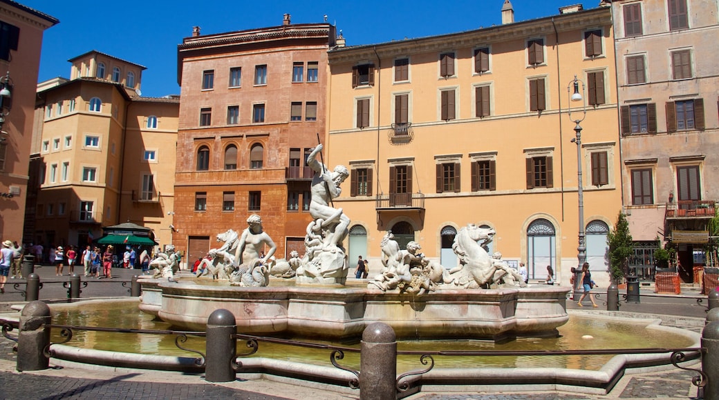 Navona showing a fountain and a statue or sculpture