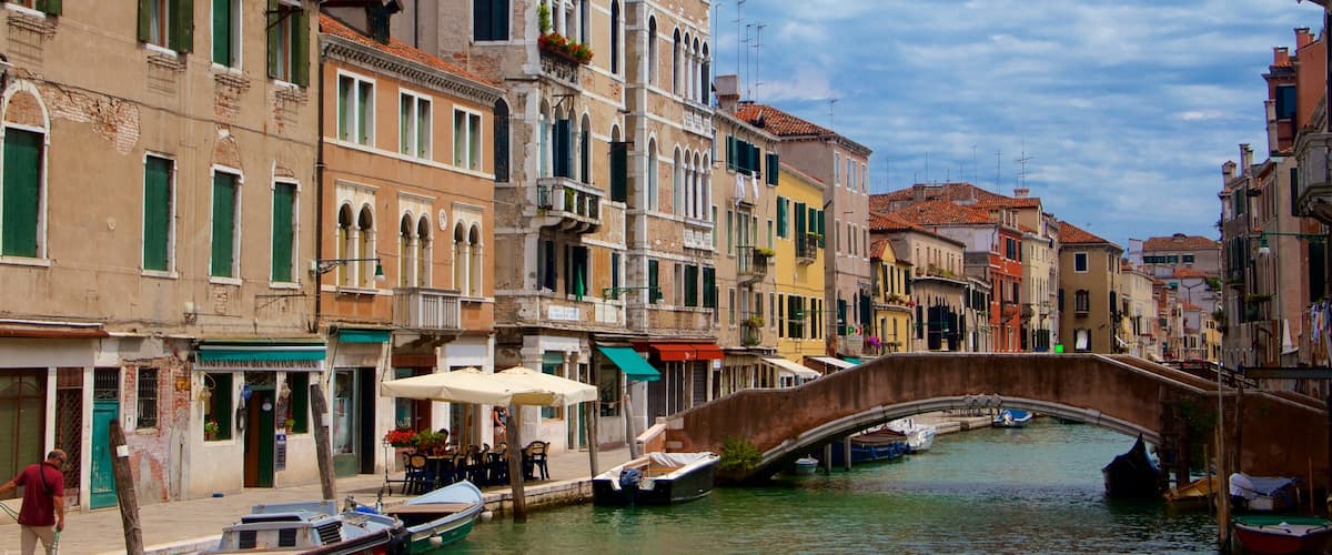 Venetian Ghetto featuring a bridge, a coastal town and heritage architecture