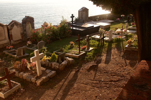 Doria Castle which includes a sunset and a cemetery