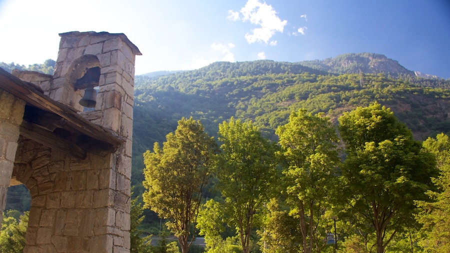 Italy featuring mountains, tranquil scenes and heritage architecture