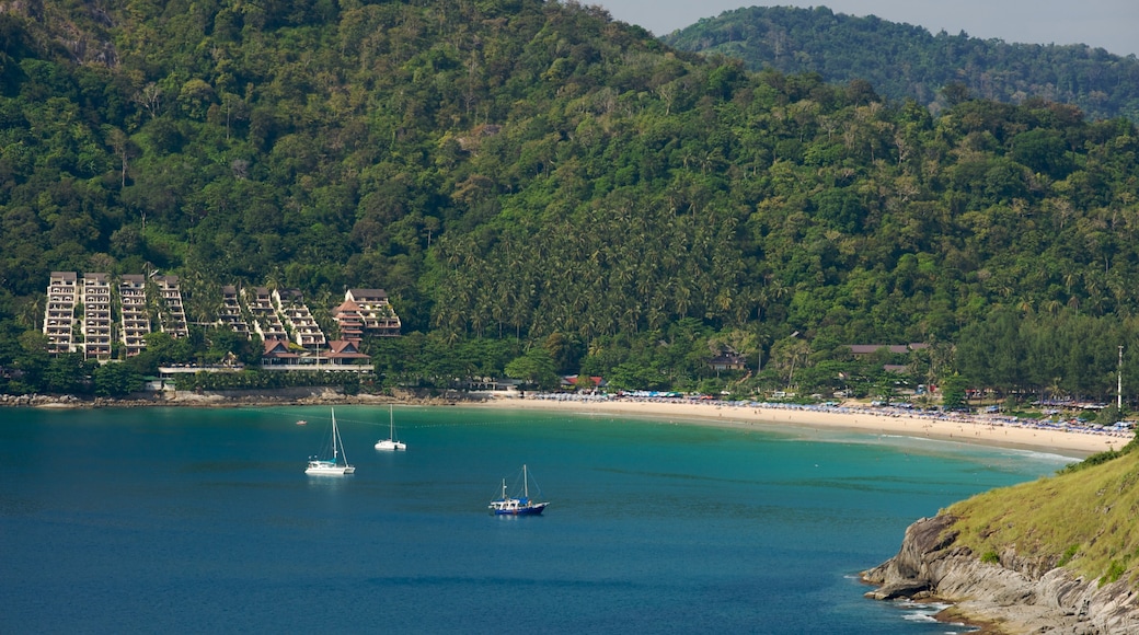 Nai Harn Beach showing boating, a coastal town and a bay or harbor