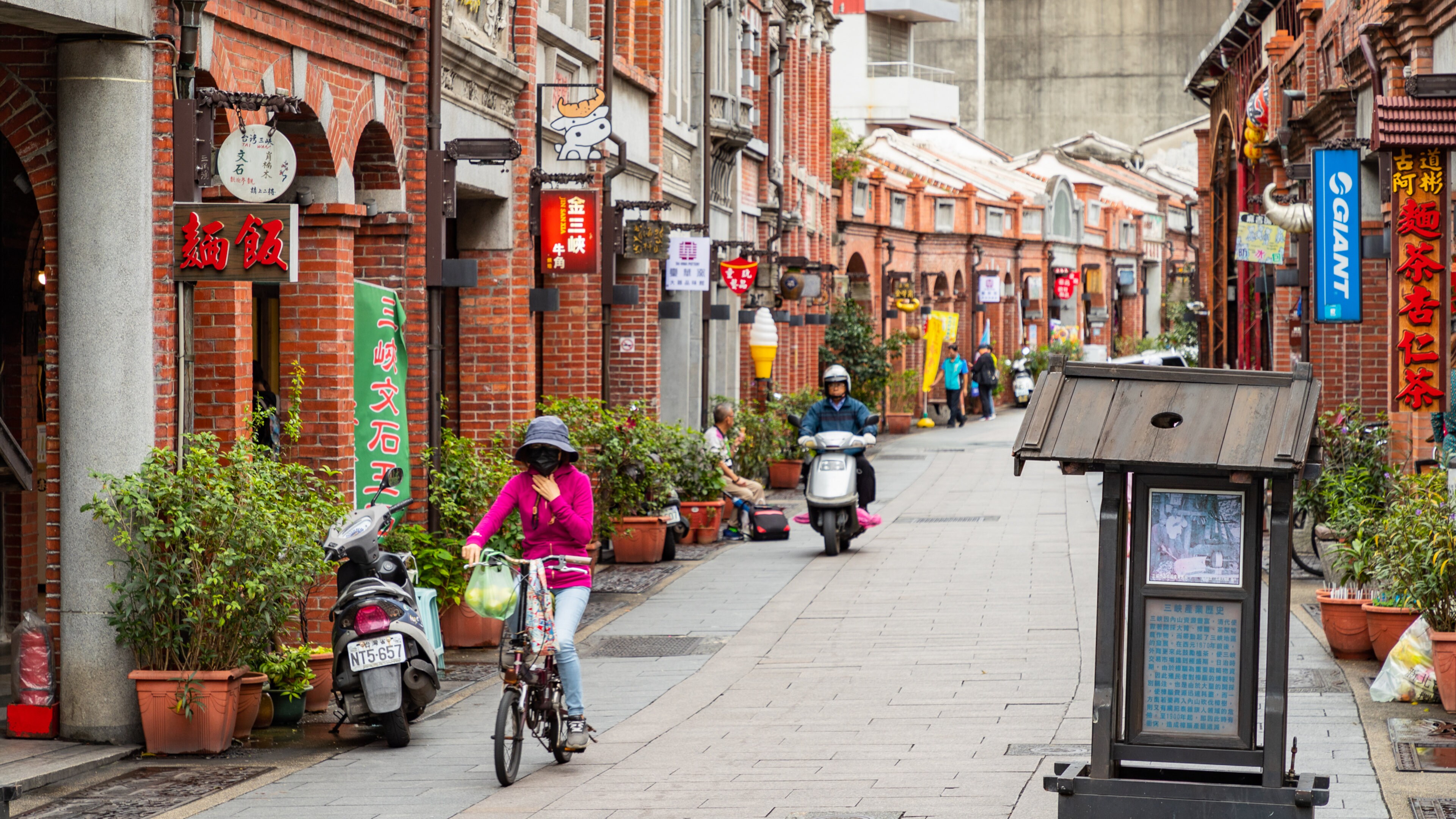 Sanxia Old Street featuring road cycling and street scenes as well as children