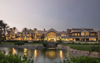 Indoor pool, outdoor pool, pool umbrellas, sun loungers