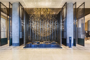 Indoor pool, open 6:00 AM to 11:00 PM, sun loungers, lifeguards on site