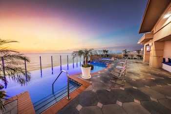 Indoor pool, seasonal outdoor pool, pool umbrellas, sun loungers