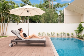 Villa, 1 King Bed, Non Smoking, Balcony | Pool | 2 outdoor pools, open 7:00 AM to 7:00 PM, sun loungers