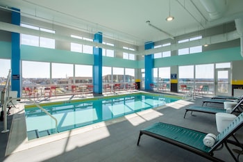Relax by the pool surrounded by comfortable seating and safety features.