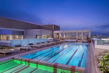 3 outdoor pools, open 6:00 AM to 6:00 PM, pool umbrellas