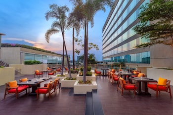 Outdoor pool, open 6 AM to 9:00 PM, sun loungers
