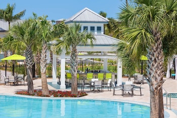 Outdoor pool, open 6:00 AM to 10:00 PM, cabanas (surcharge)