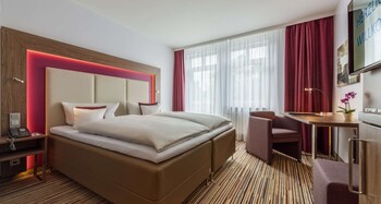 Indoor pool, open 6:30 AM to 10:30 PM, sun loungers