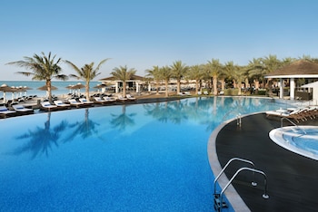 2 outdoor pools, pool umbrellas, pool loungers