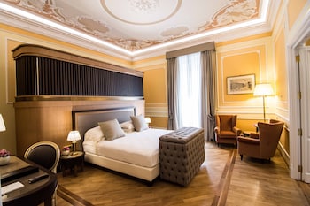 A historic hotel with ornate architecture, multiple stories, and a prominent entrance.