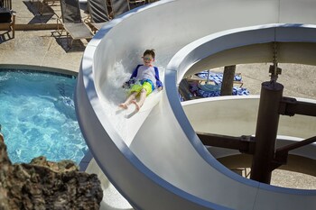 5 outdoor pools, cabanas (surcharge), pool umbrellas