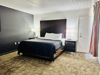 Deluxe-Suite, 1 King-Bett, Nichtraucher, Whirlpool | Individuell eingerichtet, Schreibtisch, Verdunkelungsvorhänge