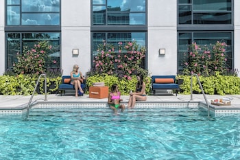 Outdoor pool, open 8:00 AM to 8:00 PM, pool umbrellas, sun loungers